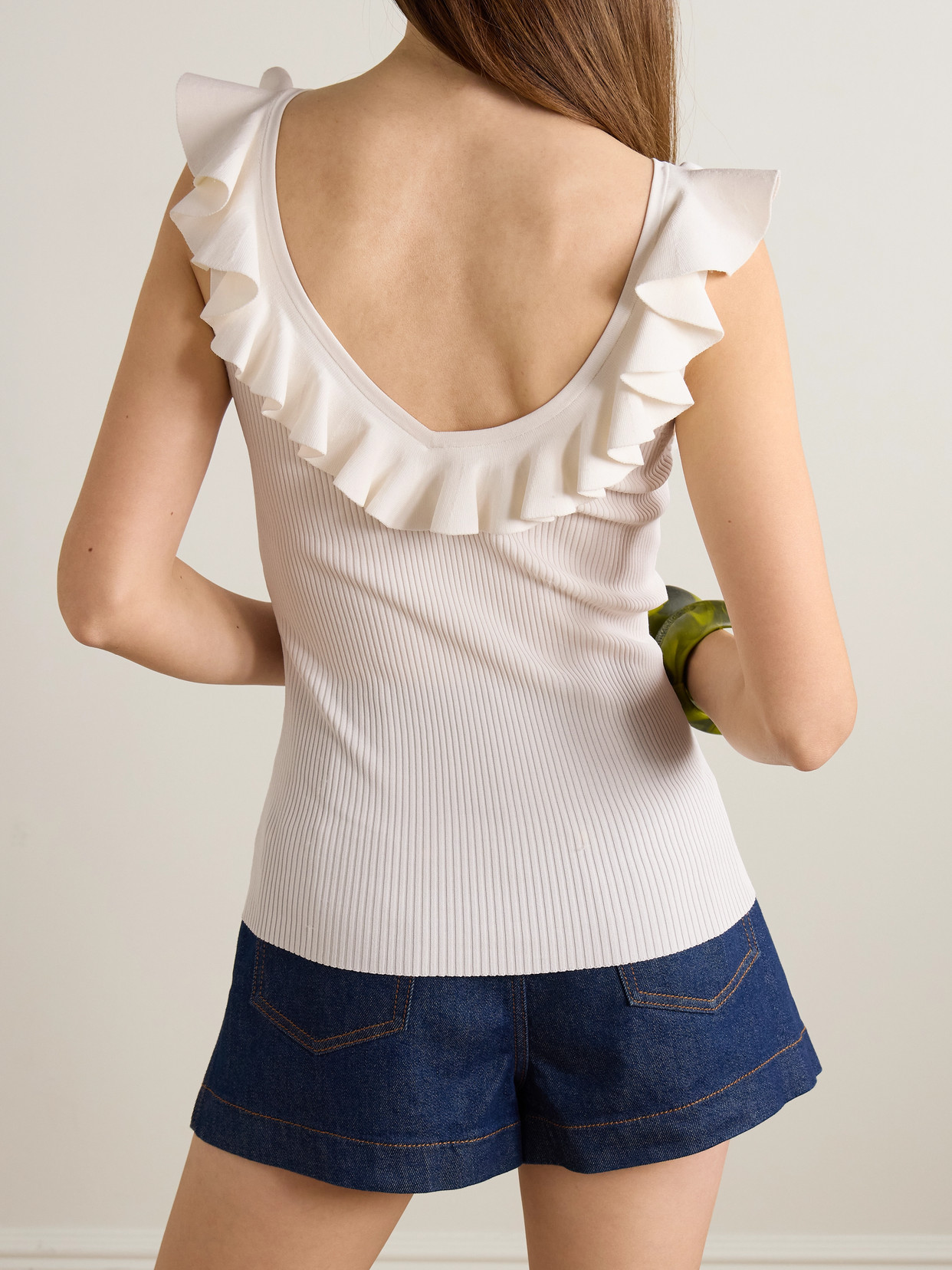 Awaken Ruffled Ribbed-Knit Top
